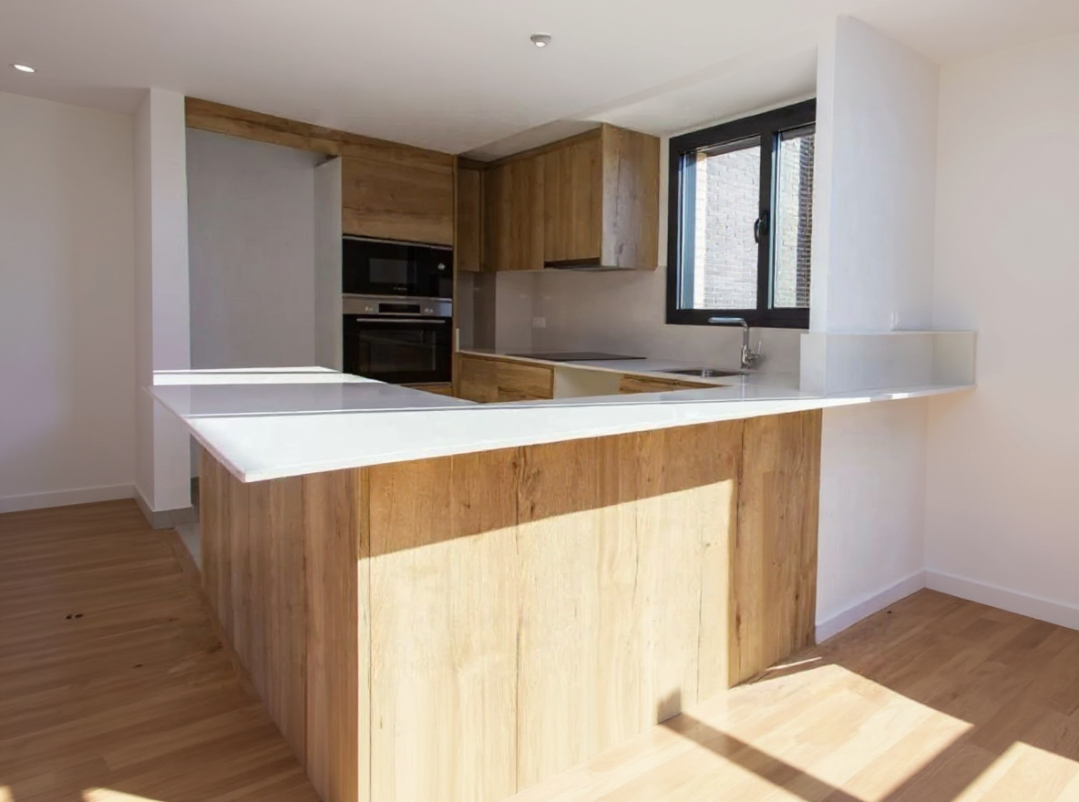 Cocina abierta con acabados en Madera